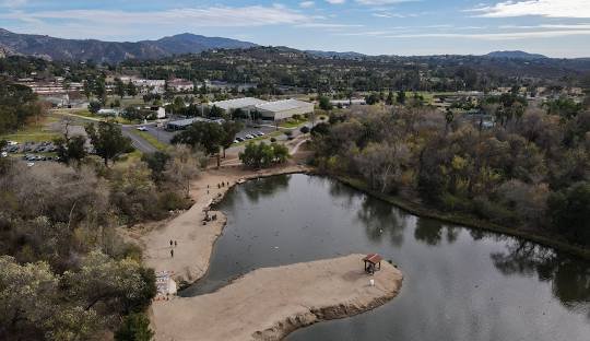 Aerial view of lake near buildings