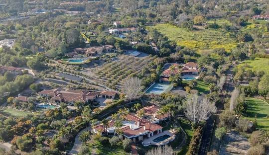 Aerial view of luxury homes and gardens